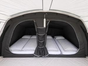 a small tent with two beds in it at Camping & Glamping Čenda in Železniki