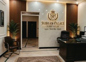 a lobby with a sign that reads southern palace guest house at Subhan Palace Guest House in Karachi