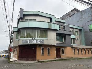 a building with the words hotel imperial on it at Hotel Imperial in Santo Domingo de los Colorados