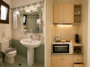a bathroom with a sink a toilet and a microwave at Angela Studios in Syvota