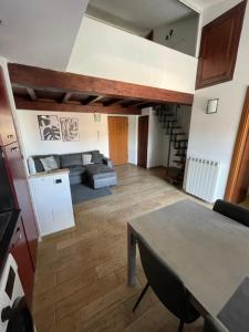 a living room with a couch and a table at Bed&Breakfast Riccio&Lella in Fiumicino