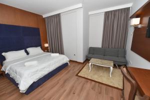 Postel nebo postele na pokoji v ubytování Golden Ring Resort