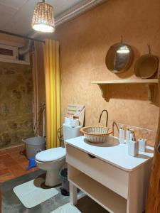 a bathroom with a toilet and a sink at Nilamane in Asilah +61 photos