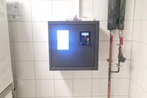 a small television on the wall of a bathroom at Studio for 2 in La Teste-de-Buch parking in La Teste-de-Buch +9 photos