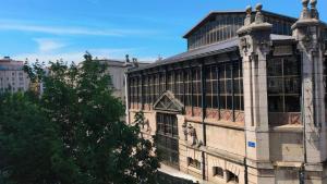 a large building with a lot of windows on it at Hospedaje Botin in Santander