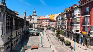 an aerial view of a city street with buildings at Hospedaje Botin in Santander