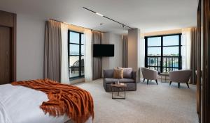 Katil atau katil-katil dalam bilik di The Mill Boutique Hotel +55 gambar