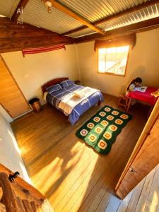 an overhead view of a bedroom in a house at Salkantay Wasi in Colcapampa
