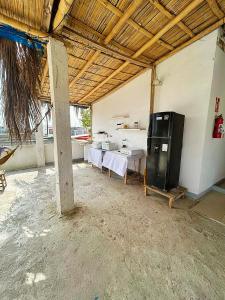 Nuotrauka iš apgyvendinimo įstaigos Pargo, habitación privada de Flor de Lis Beach House mieste Plajasas galerijos