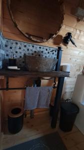 a bathroom with a sink and a counter with towels at Zum Herz in Charlotenburg +29 photos