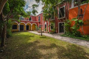 an exterior view of the courtyard of a building at Casa Jade Hotel - Adults Only, Mérida in Mérida
