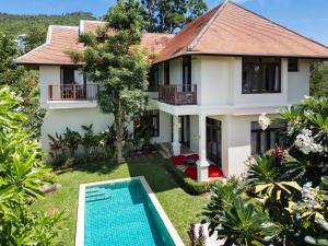 an aerial view of a house with a swimming pool at NB Villa Lilawadee in Chaweng Noi Beach