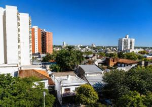 a view of a city with tall buildings at Hotel Diamante in Resistencia