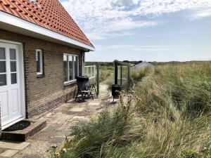 Gallery image of Duinhuis Zeewinde Midsland aan Zee in Midsland