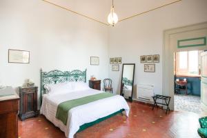 a bedroom with a large bed in a room at Villa Ceci Dimora di Storie in Andria +92 photos