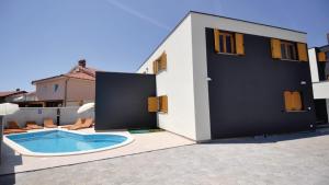 Bazén v ubytovaní Villa Palatium I alebo v jeho blízkosti