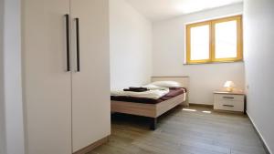 Posteľ alebo postele v izbe v ubytovaní Villa Palatium I