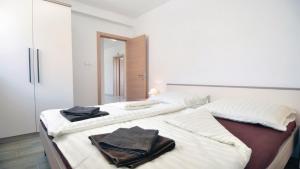 Posteľ alebo postele v izbe v ubytovaní Villa Palatium I