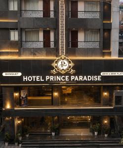 a hotel entrance with a sign that reads hotel prince paradise at Hotel Prince Paradise in Patna