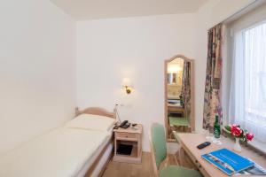 Voodi või voodid majutusasutuse Hotel Stella SA toas