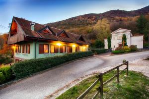 a house on the side of a road at Casa All'Angelo in Piovene Rocchette