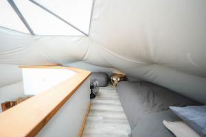 a room with a bed in a tent at Pure Heart Retreat in Cody