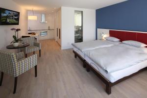 Voodi või voodid majutusasutuse Hotel Stella SA toas