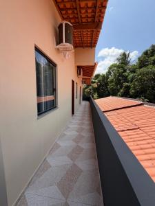 a walkway on the side of a building at Casa Dona Vilma in Barreirinhas