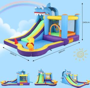 a toy inflatable water slide with a shark on it at Belle Villa Kassonyah, Conakry in Conakry