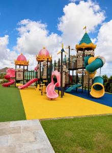 a playground at a park with a slide at Apartment in St Ann in Priory