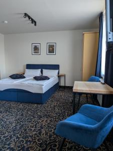 Кровать или кровати в номере Hotel in