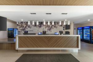 a lobby of a store with a reception desk at Best Western Plus Dauphin in Dauphin +46 photos