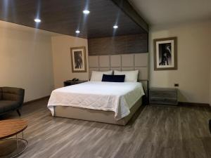 เตียงในห้องที่ Sunio City +22 ภาพ