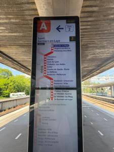 a sign at a train station with a map at Riverside Studio Joinville-Le-Pont in Joinville-le-Pont