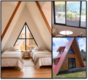 a room with two beds and a large window at Cabañas Cavanilla in Oxapampa