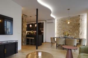 Svetainės erdvė apgyvendinimo įstaigoje Le Grand Paris Apartments