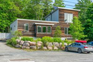 a house with a car parked in front of it at The Crag On the Acadia National Park Border - Deck, Fire Pit, Steps to Trails in Otter Creek +80 photos