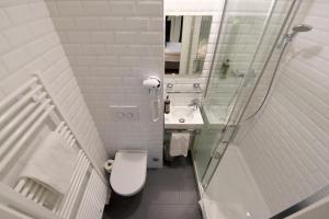 Vannituba majutusasutuses Hôtel Pax