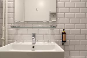 Vannituba majutusasutuses Hôtel Pax