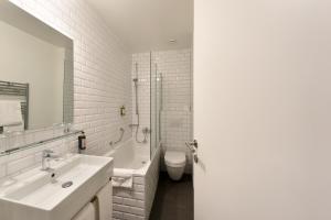 Vannituba majutusasutuses Hôtel Pax