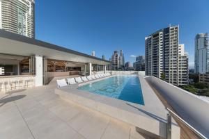 a swimming pool on the roof of a building at Bounce Surfers in Gold Coast