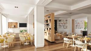 a dining room with tables and chairs at Meliá Lloret de Mar in Lloret de Mar