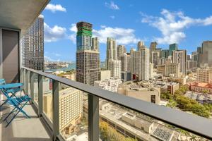 a balcony with a view of the city at The York Suite Miami in Miami