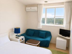 TV a/nebo společenská místnost v ubytování Hotel Cliffside