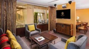 a living room with a couch and a table at Grand Lisboa Macau in Macau