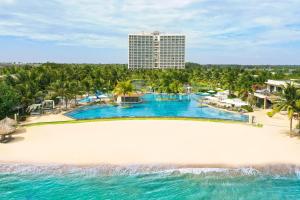 an aerial view of the pool at the excellence punta cana resort at Meliá Ho Tram Beach Resort in Ho Tram
