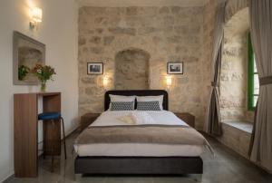 Postel nebo postele na pokoji v ubytování Heleni Hotel + 37 fotografií