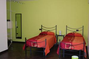 Postel nebo postele na pokoji v ubytování Agriturismo LucchettiFerrari