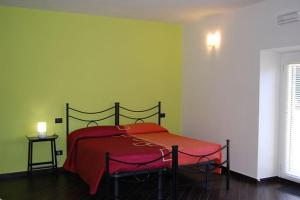 Postel nebo postele na pokoji v ubytování Agriturismo LucchettiFerrari