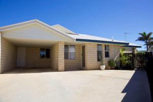 a house with a driveway in front of it at Villa LaNoah in Kalbarri
